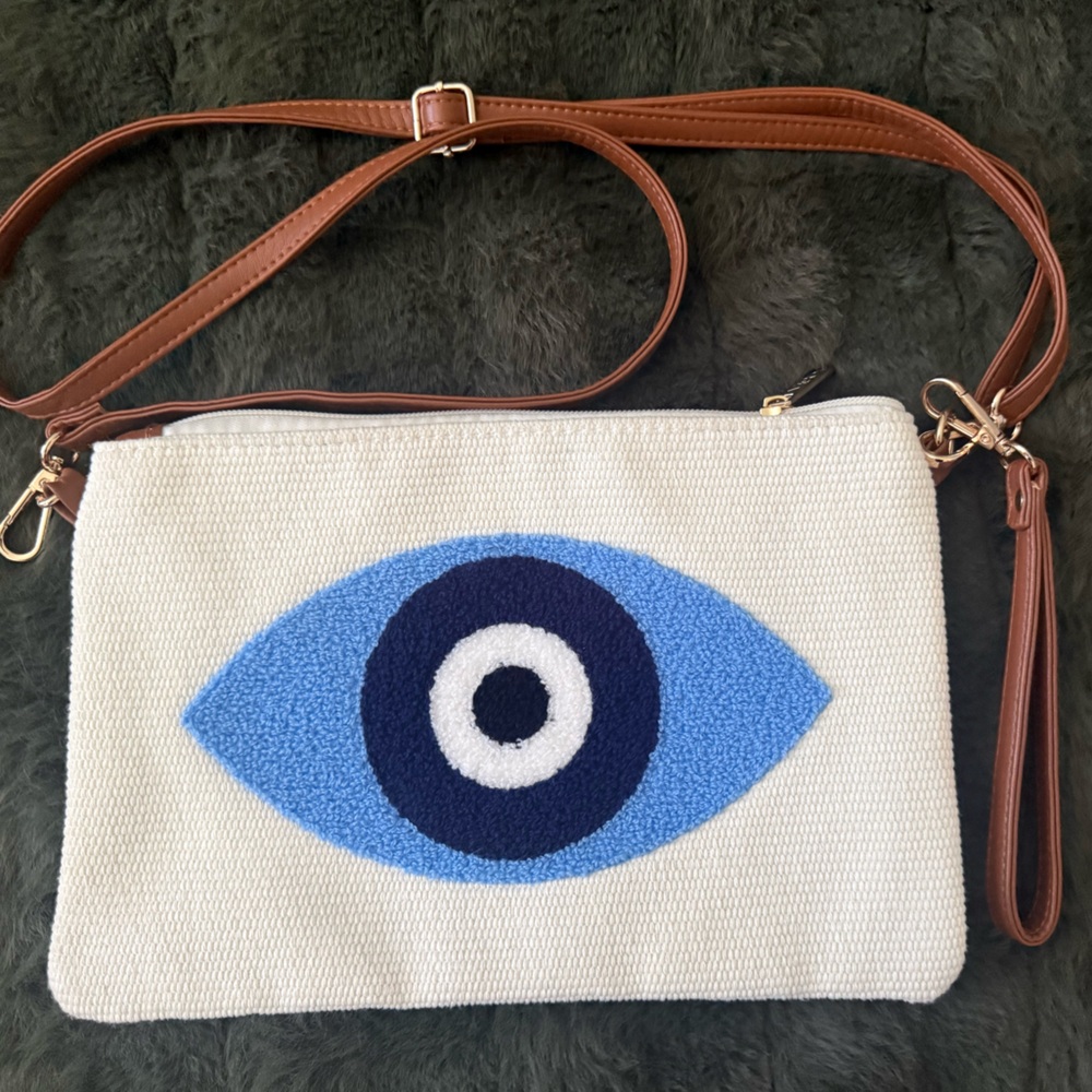 Cream Crossbody Bag with Blue Evil Eye Accent and Brown Strap